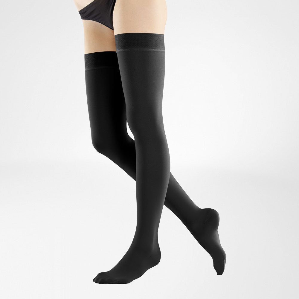 person wearing the thigh high bauerfeind medical venotrain soft compression stockings